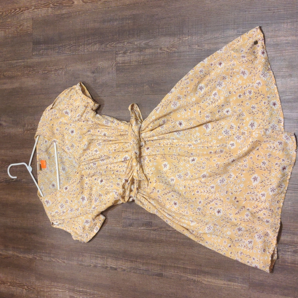 Yellow, flowered wrap sundress